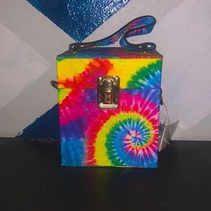 Tie dye mini square purse with chain in the inside to carry.